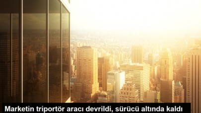 Marketin triportör aracı devrildi, sürücü altında kaldı